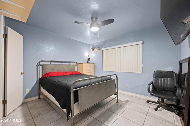 6415 W Roosevelt St, Phoenix, AZ 85043 - tiled bedroom featuring ceiling fan and baseboards