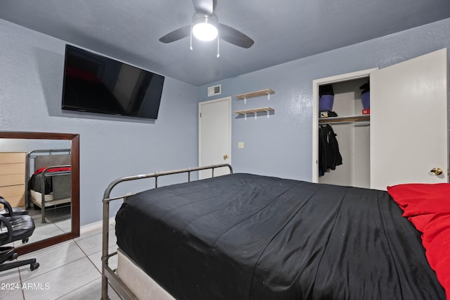 6415 W Roosevelt St, Phoenix, AZ 85043 - bedroom featuring a closet, tile patterned flooring, and a ceiling fan