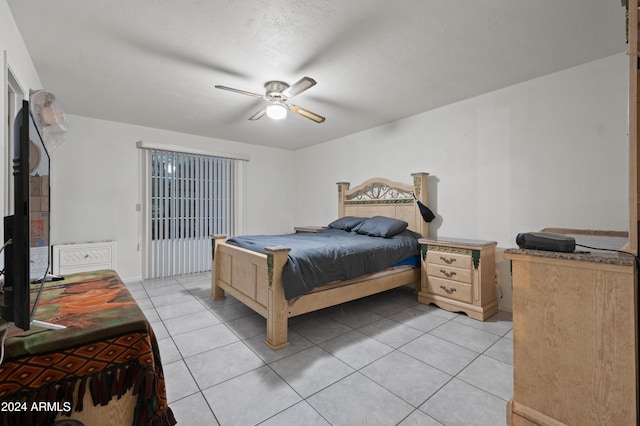6415 W Roosevelt St, Phoenix, AZ 85043 - bedroom featuring light tile patterned floors and ceiling fan