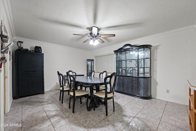 6415 W Roosevelt St, Phoenix, AZ 85043 - dining area with a ceiling fan, crown molding, and a textured ceiling