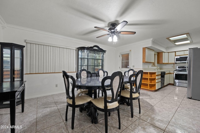 6415 W Roosevelt St, Phoenix, AZ 85043 - dining room featuring crown molding, a ceiling fan, light tile patterned flooring, and a textured ceiling
