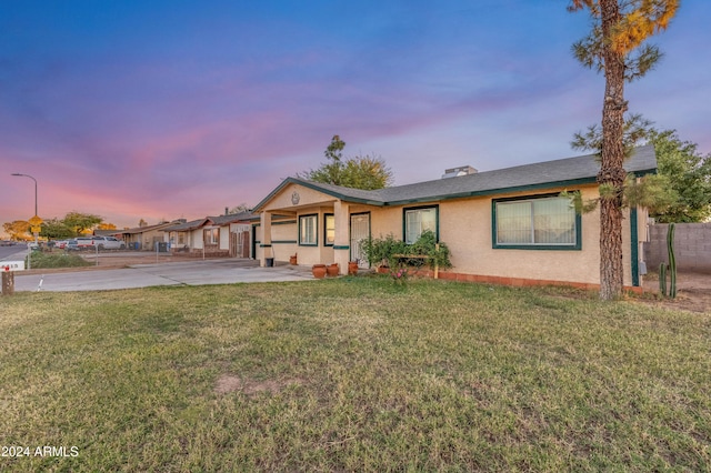 6415 W Roosevelt St, Phoenix, AZ 85043 - single story home with stucco siding and driveway