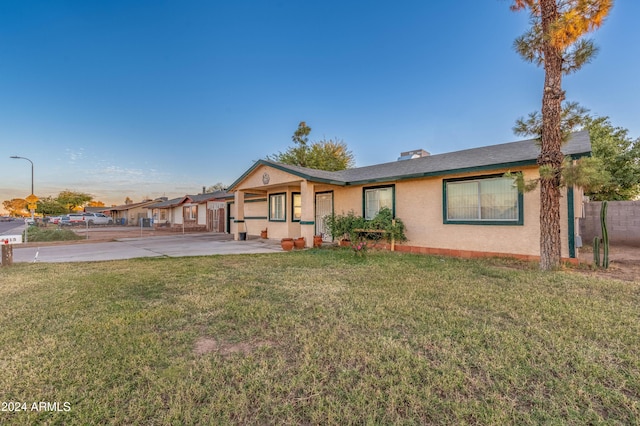 6415 W Roosevelt St, Phoenix, AZ 85043 - ranch-style house featuring stucco siding