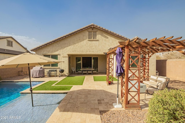 rear view of property with a patio, fence, a fenced in pool, a pergola, and stucco siding