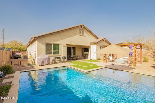 view of swimming pool with a patio, a fenced backyard, a fenced in pool, and a grill