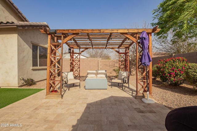 view of patio / terrace with a fenced backyard, outdoor lounge area, and a pergola