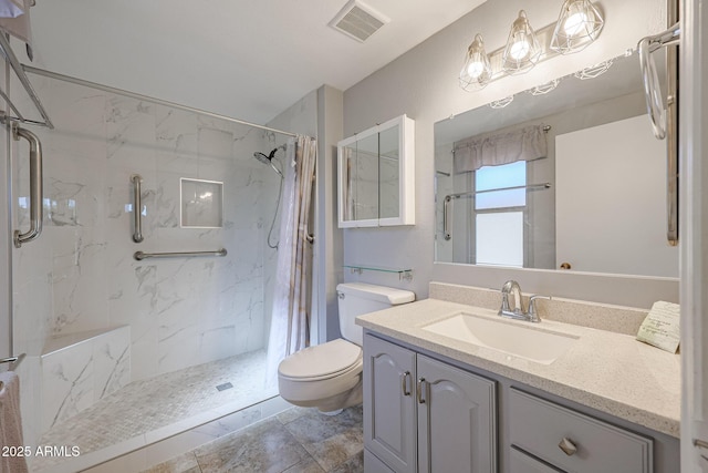 bathroom with walk in shower, vanity, and toilet