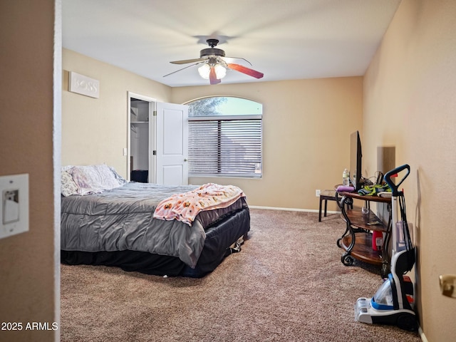 bedroom with carpet flooring, a ceiling fan, and baseboards