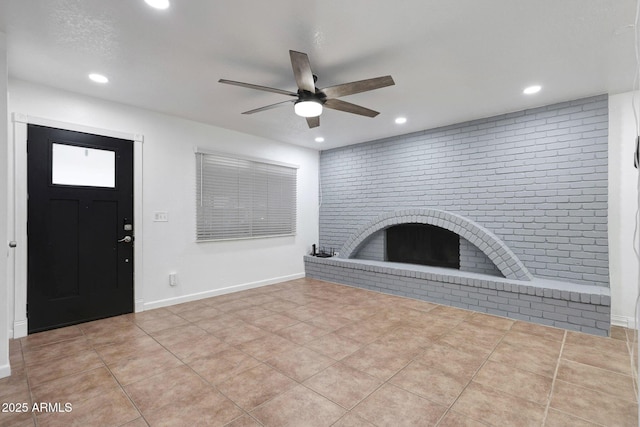 8202 W Turney Ave, Phoenix, AZ 85033 - unfurnished living room featuring recessed lighting, a fireplace, ceiling fan, and tile patterned floors