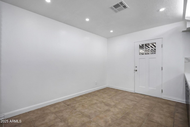 8202 W Turney Ave, Phoenix, AZ 85033 - spare room featuring recessed lighting and baseboards