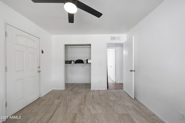 8202 W Turney Ave, Phoenix, AZ 85033 - unfurnished bedroom featuring a closet and a ceiling fan