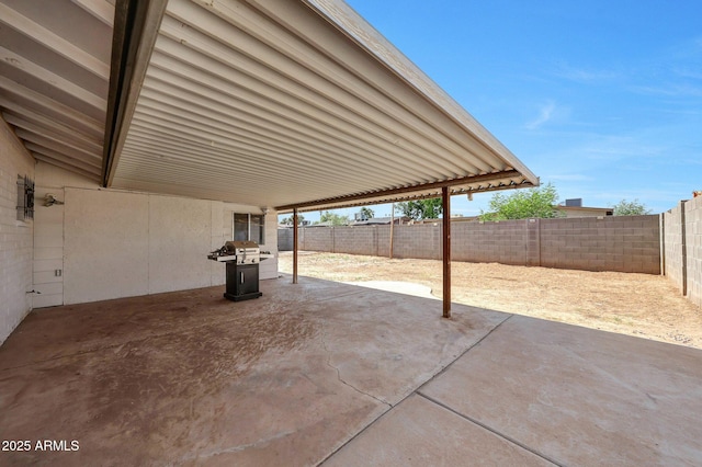 8202 W Turney Ave, Phoenix, AZ 85033 - fenced backyard featuring a patio area and grilling area