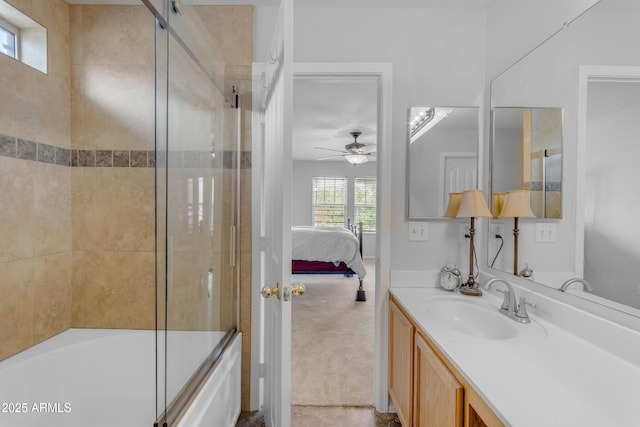 ensuite bathroom featuring shower / bath combination with glass door, vanity, and ensuite bath