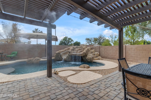 view of patio / terrace featuring a fenced backyard and a pergola