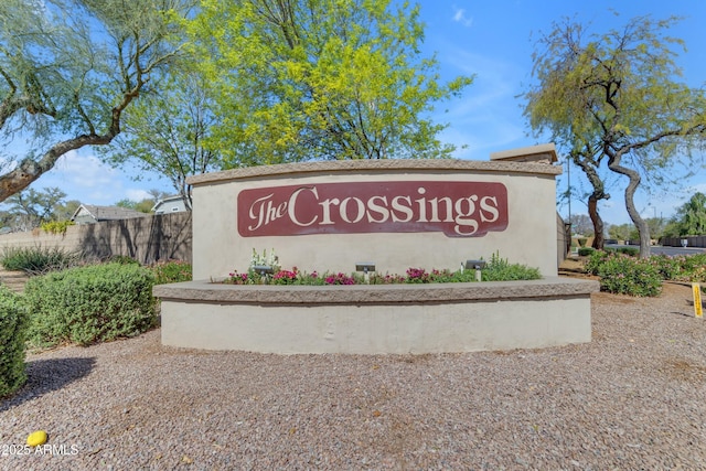 community sign with fence