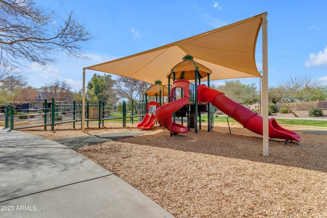 community jungle gym with fence