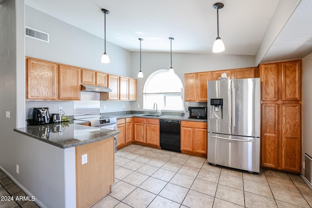 kitchen featuring dark stone counters, pendant lighting, kitchen peninsula, and black appliances