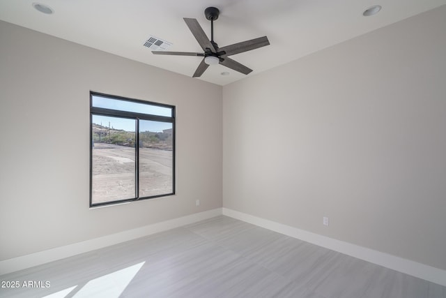 unfurnished room featuring ceiling fan