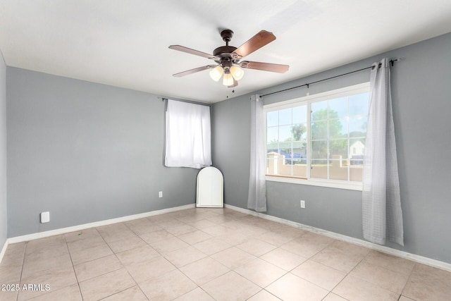 2064 W 2nd St, Mesa, AZ 85201 - spare room with a ceiling fan, baseboards, and light tile patterned floors