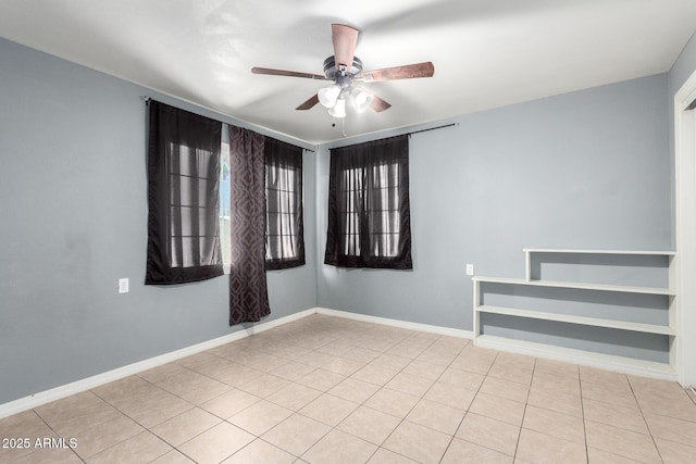 2064 W 2nd St, Mesa, AZ 85201 - unfurnished room featuring a ceiling fan, tile patterned floors, and baseboards