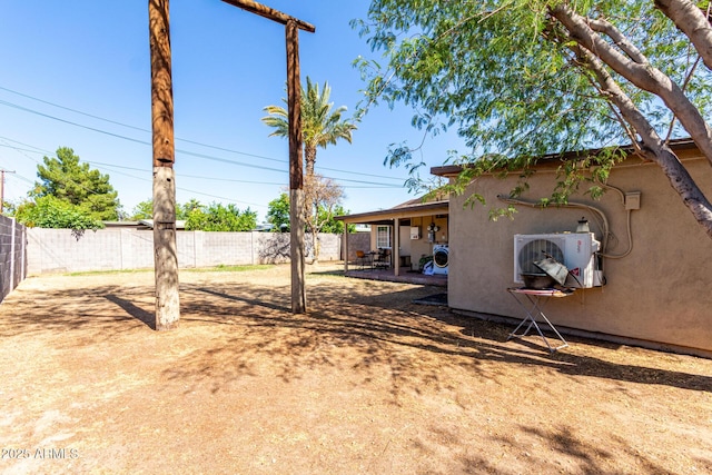 2064 W 2nd St, Mesa, AZ 85201 - fenced backyard with a cooling unit and a patio