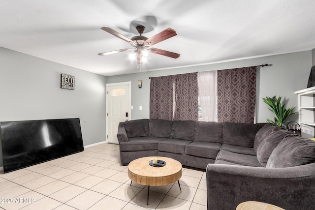 2064 W 2nd St, Mesa, AZ 85201 - living room featuring ceiling fan, light tile patterned floors, and baseboards