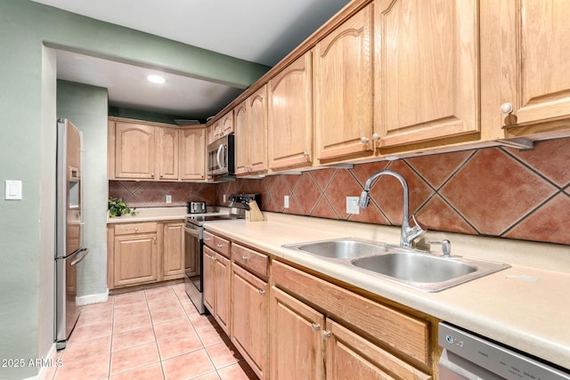 2064 W 2nd St, Mesa, AZ 85201 - kitchen with stainless steel appliances, a sink, light brown cabinetry, and recessed lighting