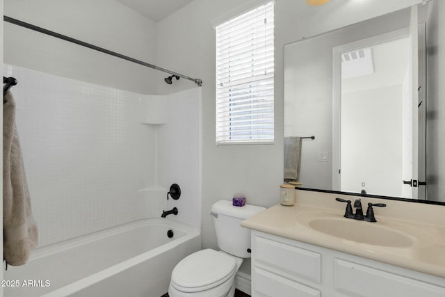 full bathroom featuring shower / bath combination, vanity, and toilet