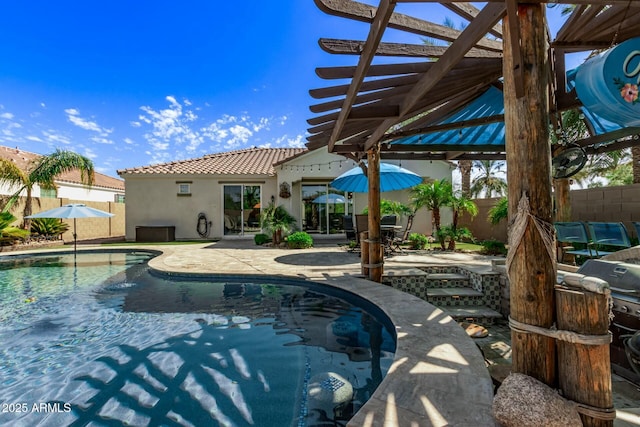 view of swimming pool featuring a fenced in pool, a grill, fence, a hot tub, and a patio