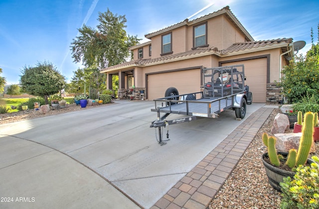 view of front of home with a garage