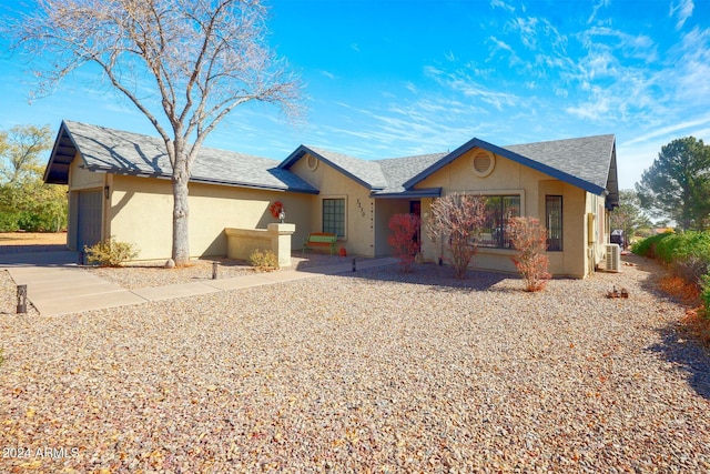 ranch-style home with a garage