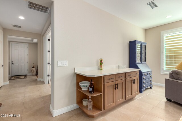 interior space with tile patterned floors