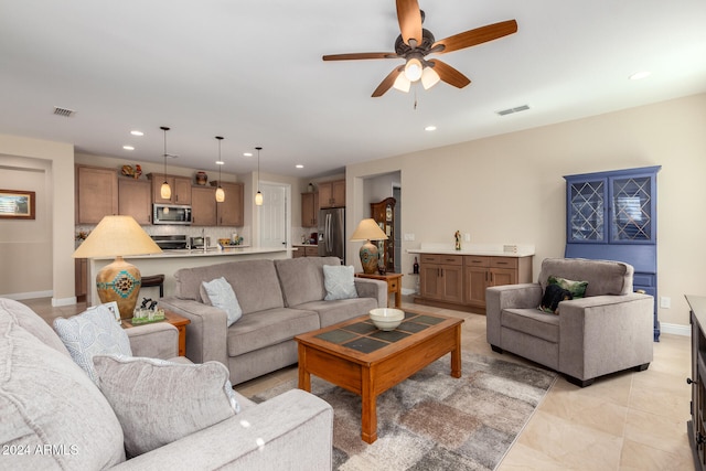 living room with ceiling fan