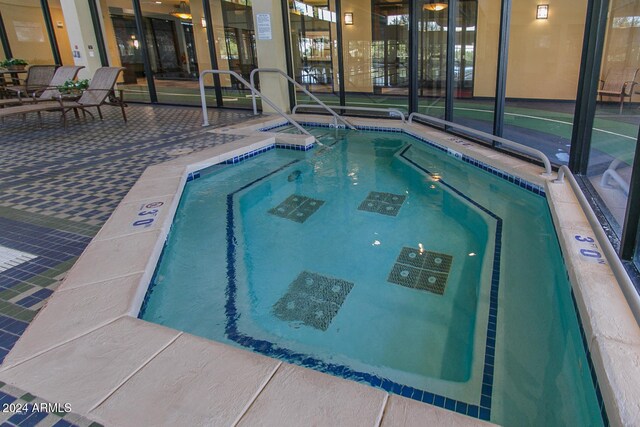 view of swimming pool with a patio