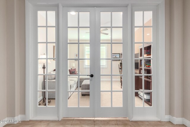 entryway featuring french doors and plenty of natural light