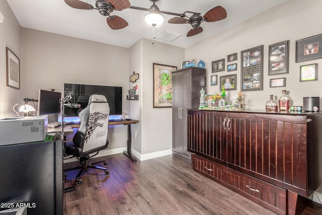 office featuring hardwood / wood-style floors and ceiling fan