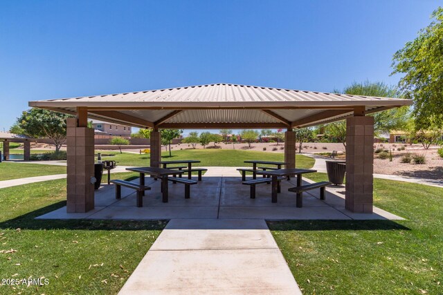 surrounding community featuring a gazebo and a yard