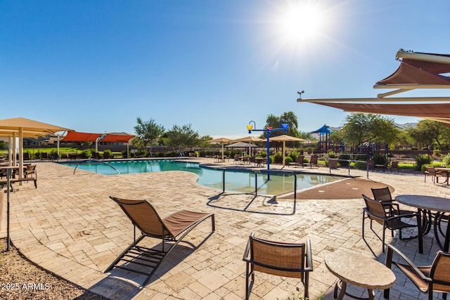 view of swimming pool featuring a patio