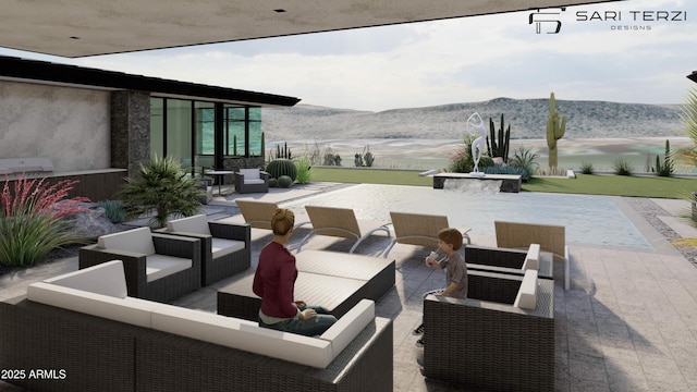 view of patio with a mountain view and an outdoor hangout area