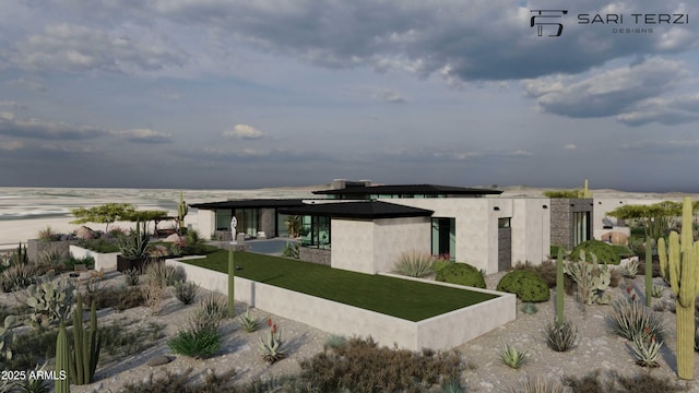 back of house with a yard and stucco siding