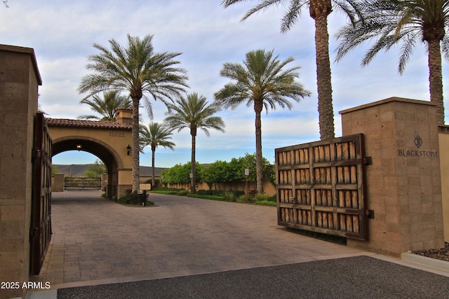 exterior space with a gate