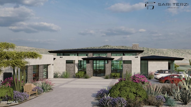 view of exterior entry featuring stucco siding