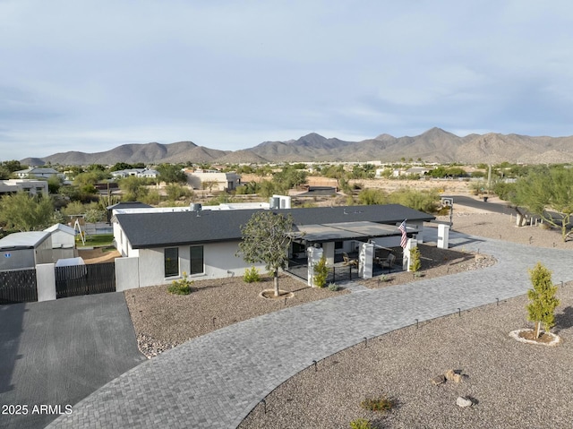 view of front of home featuring a mountain view