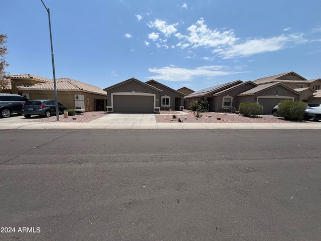 ranch-style home with a garage