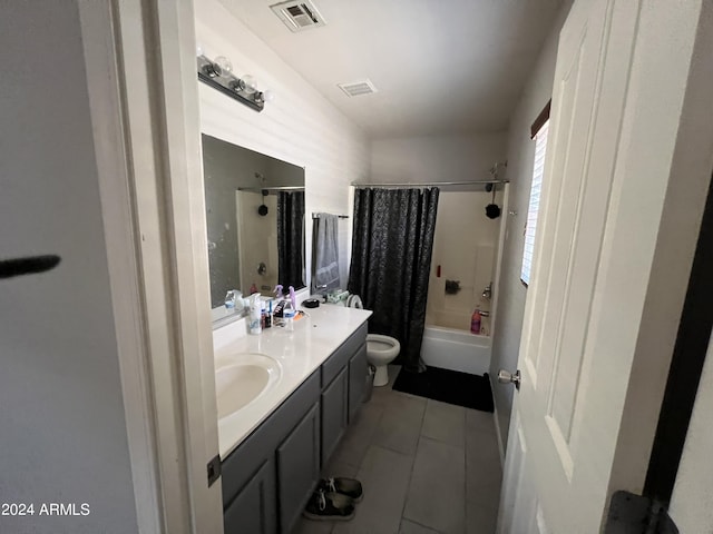 full bathroom featuring vanity, tile patterned floors, shower / bath combination with curtain, and toilet