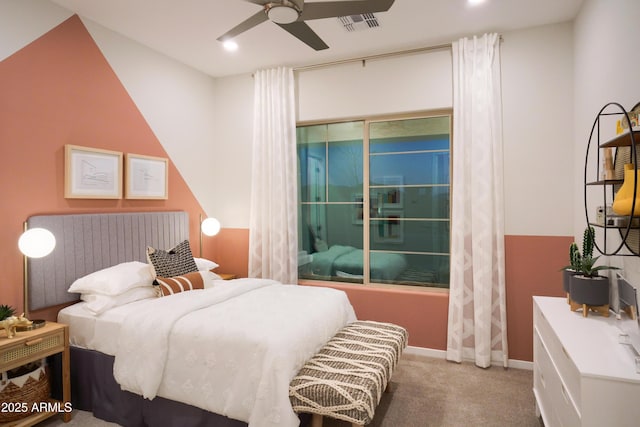 bedroom featuring carpet, radiator heating unit, and ceiling fan