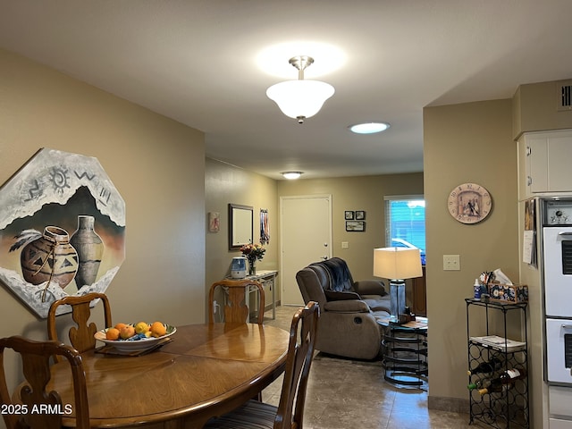 view of tiled dining area