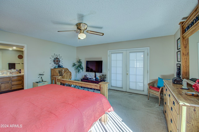 carpeted bedroom with ceiling fan, access to exterior, a textured ceiling, and french doors