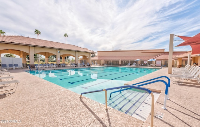 view of swimming pool featuring a patio