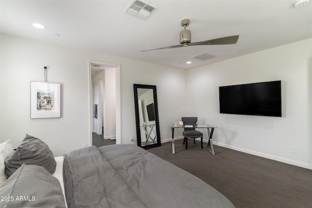 bedroom with baseboards, dark colored carpet, and visible vents